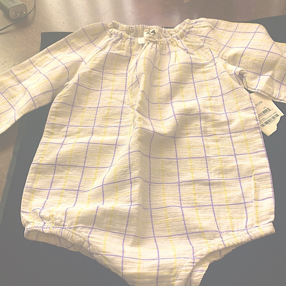 Baby girls 2 piece outfit . It is a body suit and pants.